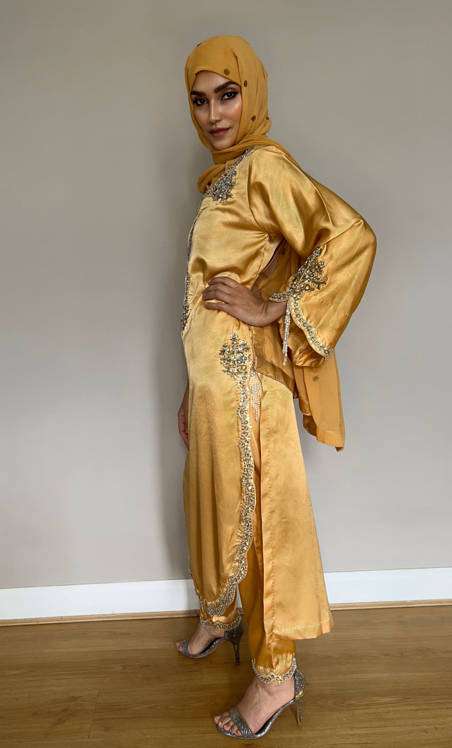 Pakistani formal outfit with chiffon dupatta and pearl detailing