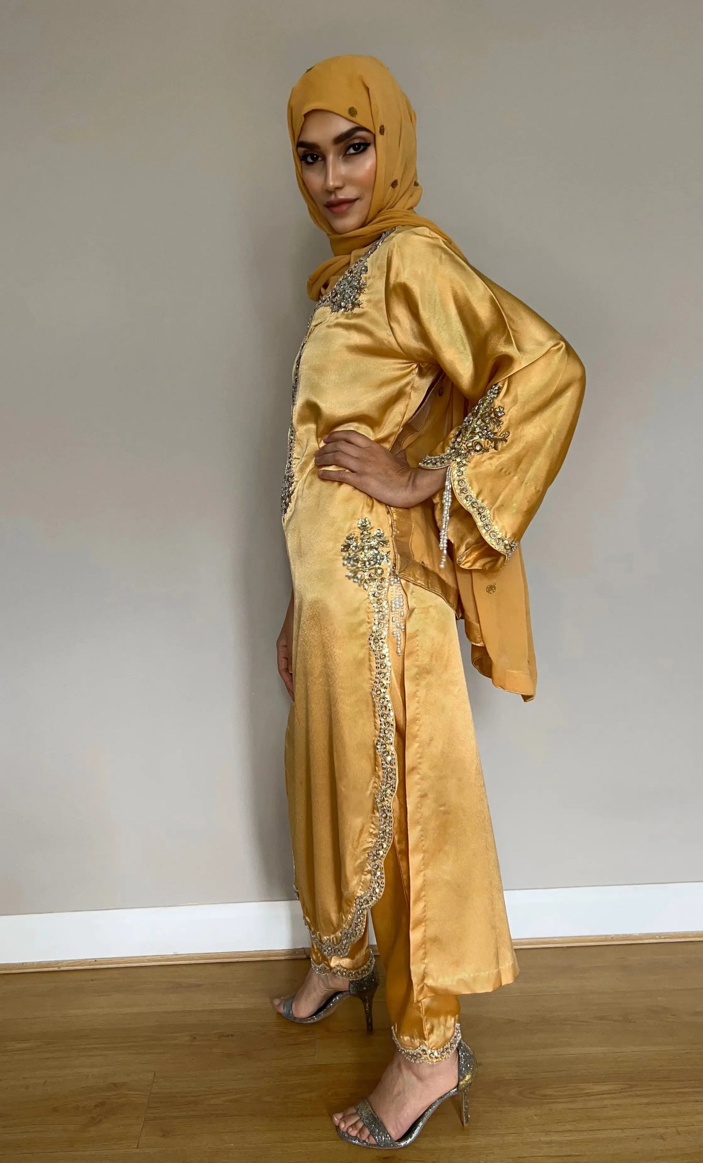 Pakistani formal outfit with chiffon dupatta and pearl detailing
