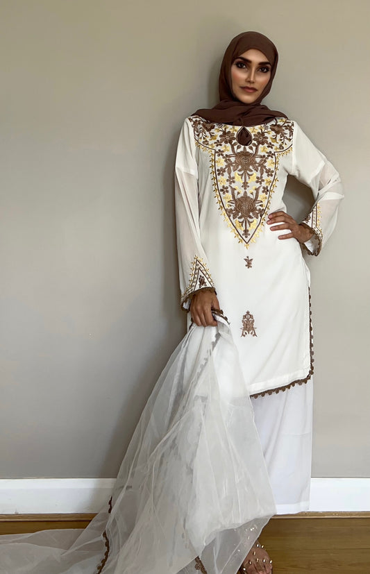 Elegant pearl white chiffon kameez with keyhole neckline and satin thread embroidery.